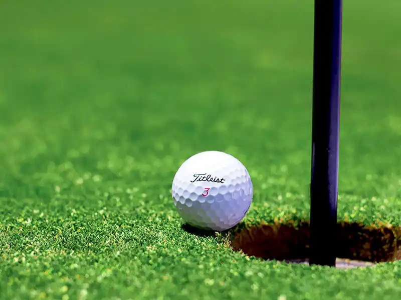 Golf ball near hole